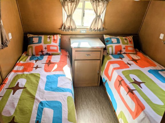 Inside Holiday House RV - Beds